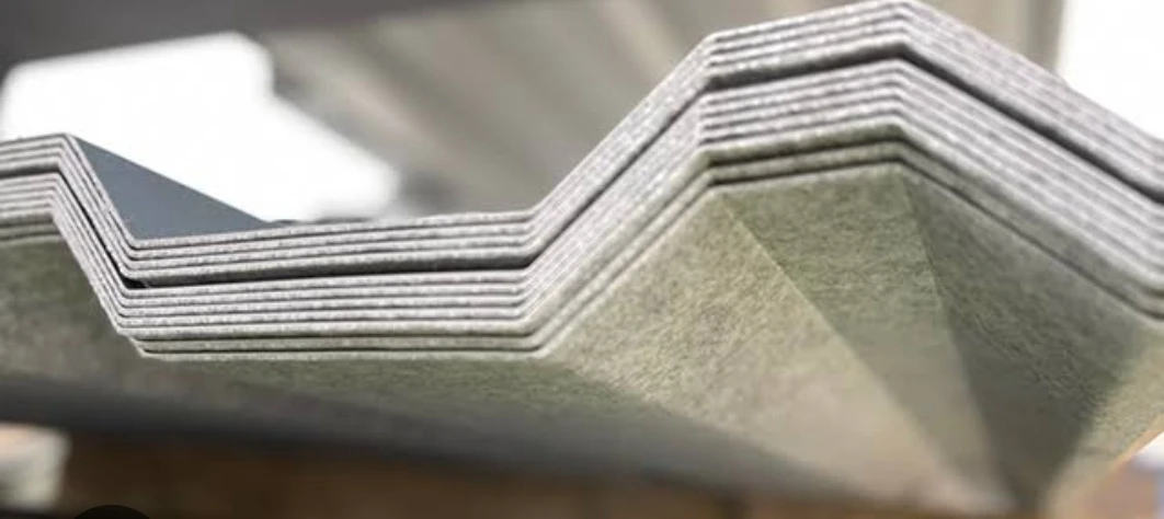 Dripstop membrane bonded to a profiled metal roof sheet
